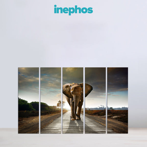 Five-panel wall art of an elephant walking on a path with 'inephos' branding.