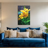 Blue sofa with decorative pillows in a living room setting, featuring a floral painting on the wall.