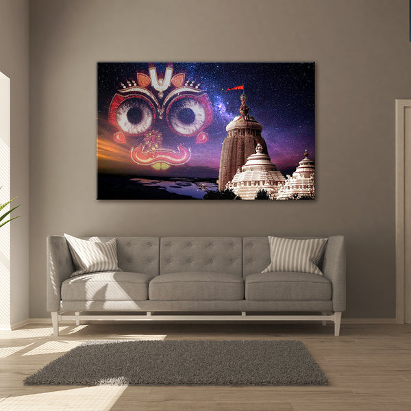 Living room with a large wall art piece featuring a temple and colorful face design.