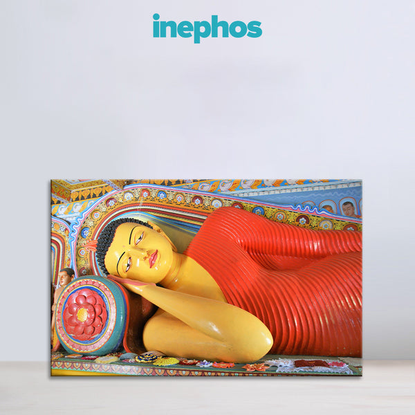 Colorful depiction of a reclining Buddha with 'inephos' branding.