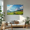 Living room with a painting of a mountain landscape on the wall