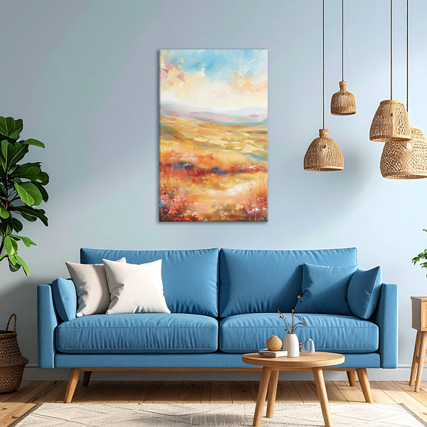 Living room with a blue sofa, colorful painting, and hanging lamps.