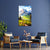Lavish living room with a mountain landscape painting on a blue wall.