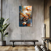 Abstract floral painting on a wall above a bench in a room with wooden flooring and a plant.