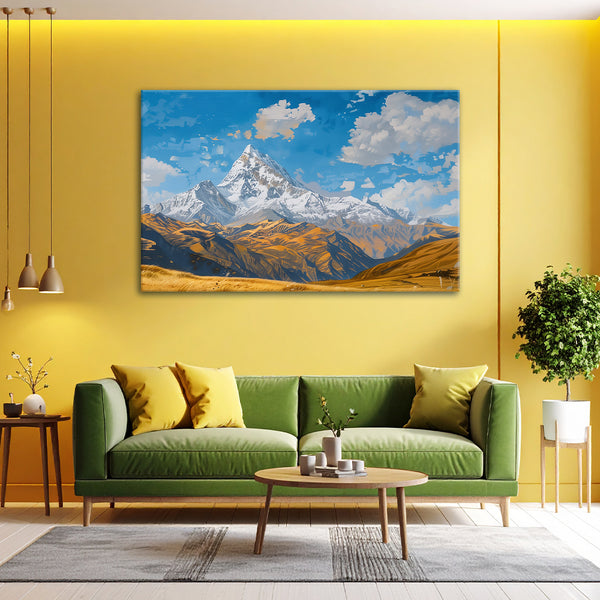 Living room with a green sofa, coffee table, and mountain painting on a yellow wall.