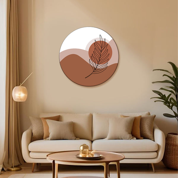 Living room with a beige sofa, decorative pillows, a round coffee table, and a wall art piece.