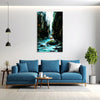 Modern living room with a blue sofa, coffee table, and wall art of a nature scene.