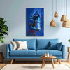 Living room with a blue sofa, abstract painting, and wooden coffee table.