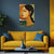 Yellow sofa with blue cushions in a living room, featuring a wall art of a woman's face.