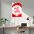 Red and white decorative wall poster on a gray wall above a desk with a plant and lamp.