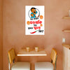 Cartoon character poster on a wall with a small table and chairs below.