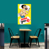 Cartoon poster on a teal wall above a table and chairs