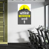 Gym interior with exercise bikes and motivational poster on the wall