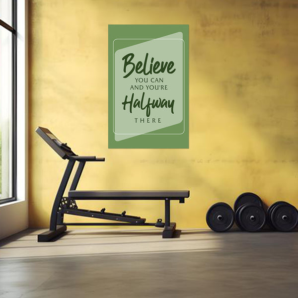 Motivational poster on a yellow wall with gym equipment below