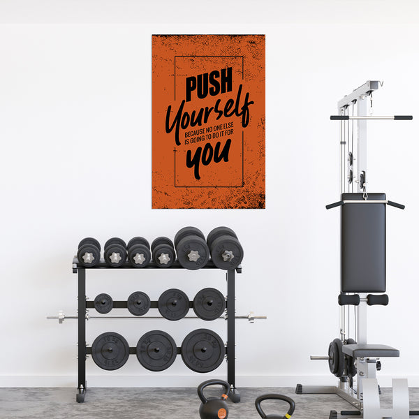 Gym equipment with motivational poster on a white wall