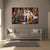 Triptych painting of deities on a wall above a gray sofa in a living room.