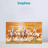 Five white horses running together on a wall art with 'inephos' branding.