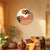 Desert Sunset Round Canvas Wall Art | Minimalist Terracotta Mountains & Black Leaf Silhouettes for Boho | Modern Contemporary Home Décor