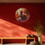 Energetic Beats | Round Canvas Painting | Wall Art of Traditional Indian Drummer in Fiery Festive Ambience