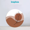 Round decorative item with leaf design and 'inephos' branding on a light gray background