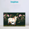 Decorative panel with a cow and calf illustration in a floral setting, branded 'inephos'.