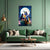 Framed artwork of two figures against a moonlit sky above a green sofa.