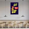 Colorful poster with cartoon character and text on a wall above a dining area.