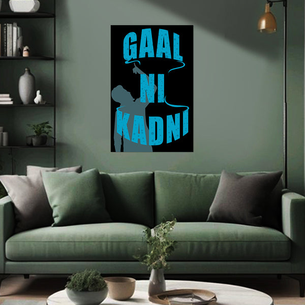 Living room with a green sofa and a decorative poster on the wall.
